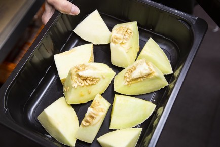 Treats for a hot day at central kitchen of Korkeasaari Zoo: frozen honeydew melon for wild boars and peccaries